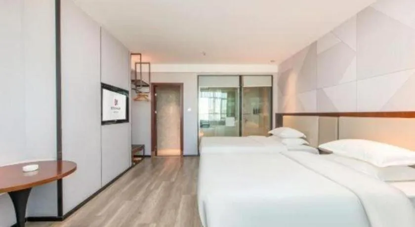 Bed in Borrman Hotel Yunfu Xinxing County Bus Station