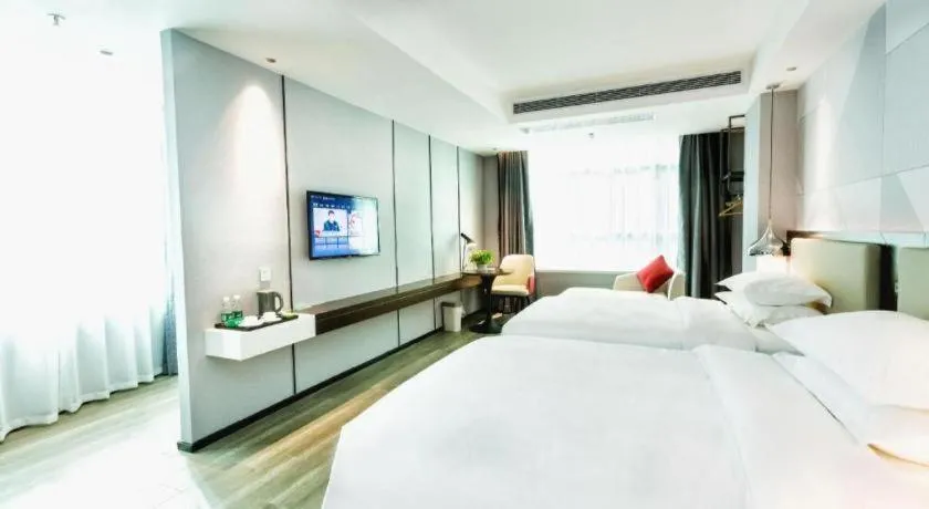 Bed in Borrman Hotel Yunfu Xinxing County Bus Station