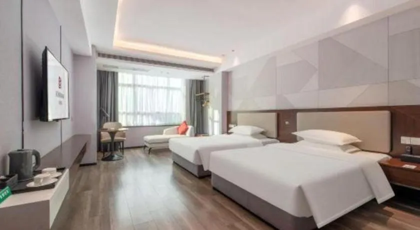 Bed in Borrman Hotel Yunfu Xinxing County Bus Station