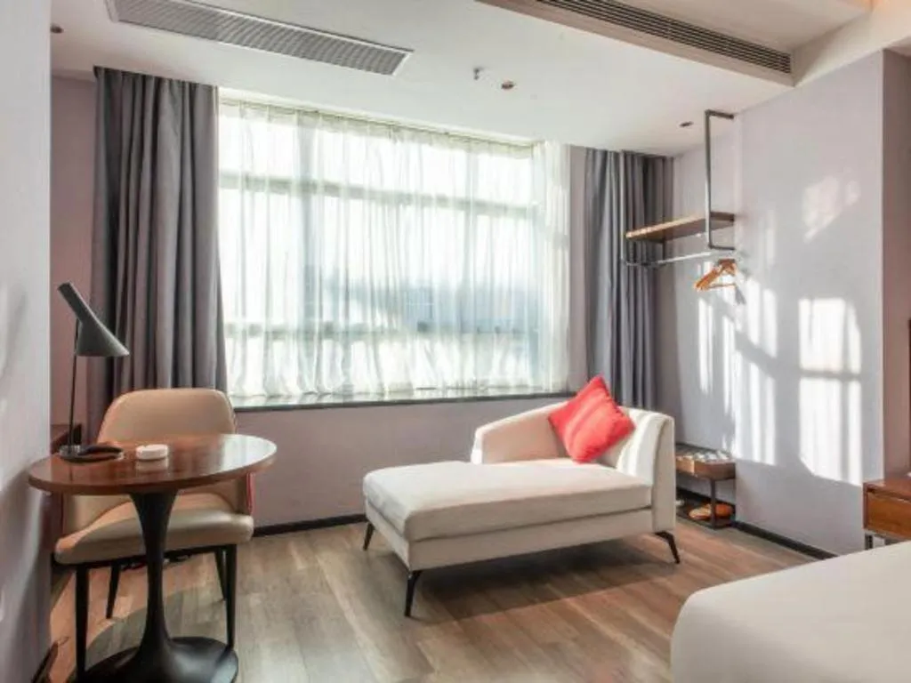 Bed in Borrman Hotel Yunfu Xinxing County Bus Station