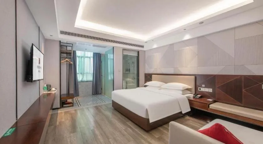 Bed in Borrman Hotel Yunfu Xinxing County Bus Station