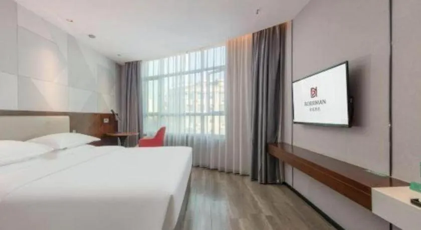 Bed in Borrman Hotel Yunfu Xinxing County Bus Station