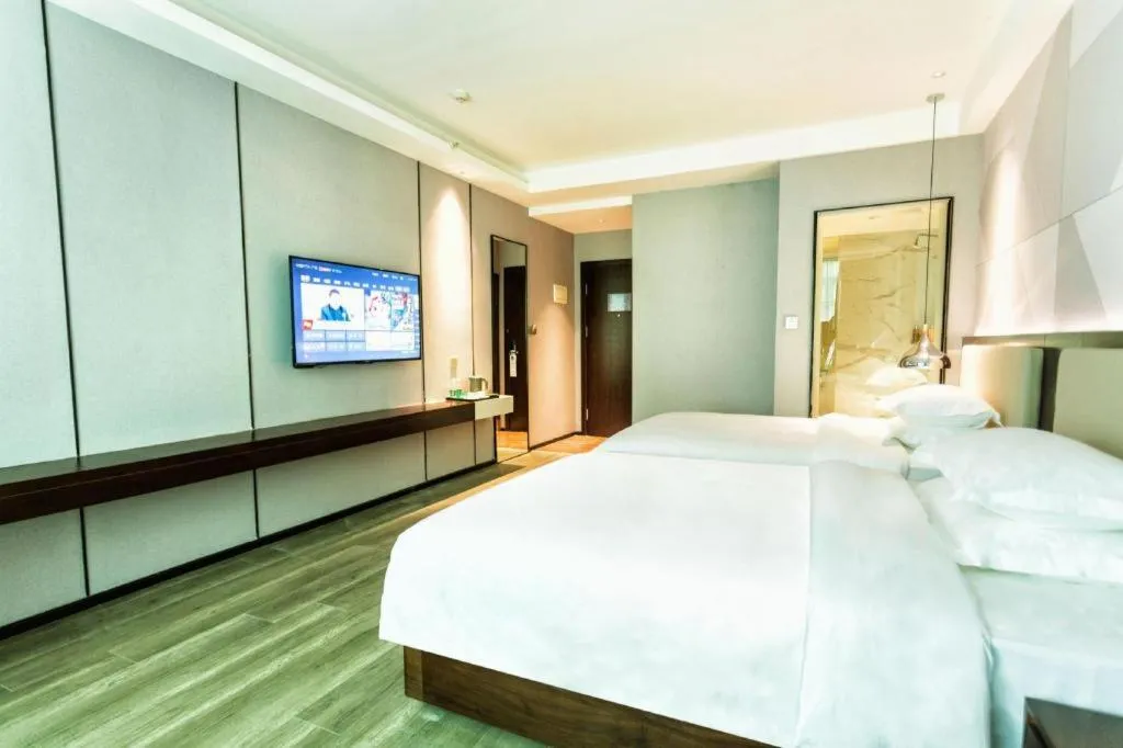 Bed in Borrman Hotel Yunfu Xinxing County Bus Station