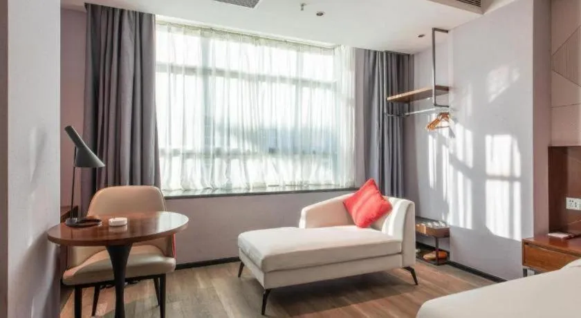 Bed in Borrman Hotel Yunfu Xinxing County Bus Station