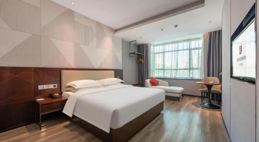 Bed in Borrman Hotel Yunfu Xinxing County Bus Station