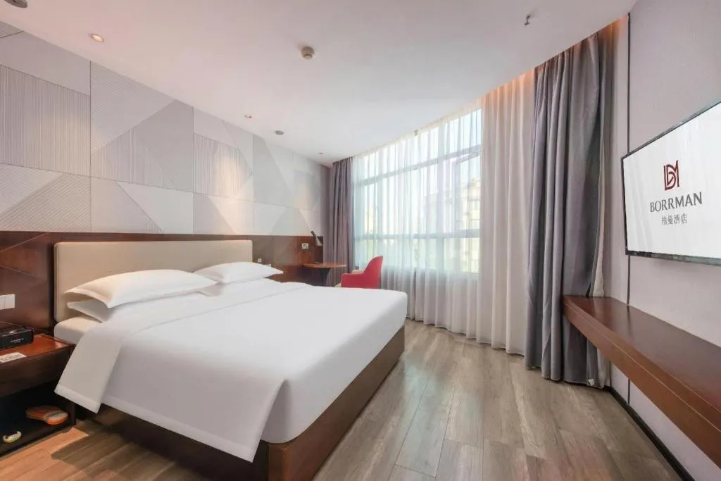 Bed in Borrman Hotel Yunfu Xinxing County Bus Station