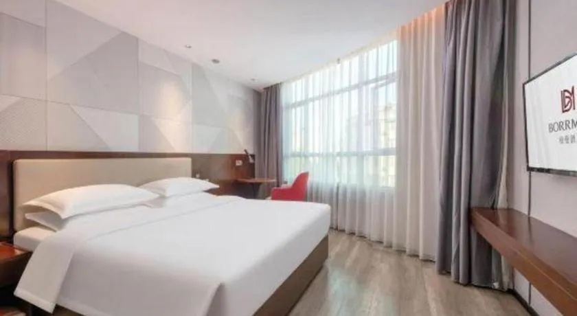 Bed in Borrman Hotel Yunfu Xinxing County Bus Station