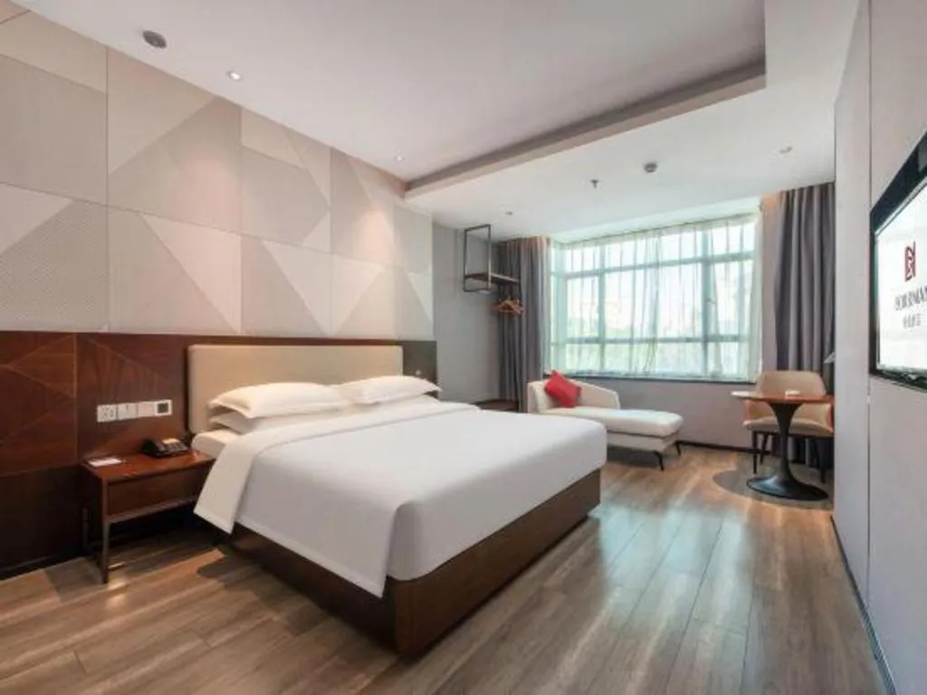 Bed in Borrman Hotel Yunfu Xinxing County Bus Station