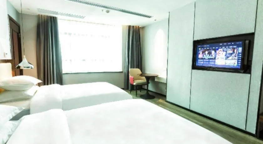 Bed in Borrman Hotel Yunfu Xinxing County Bus Station