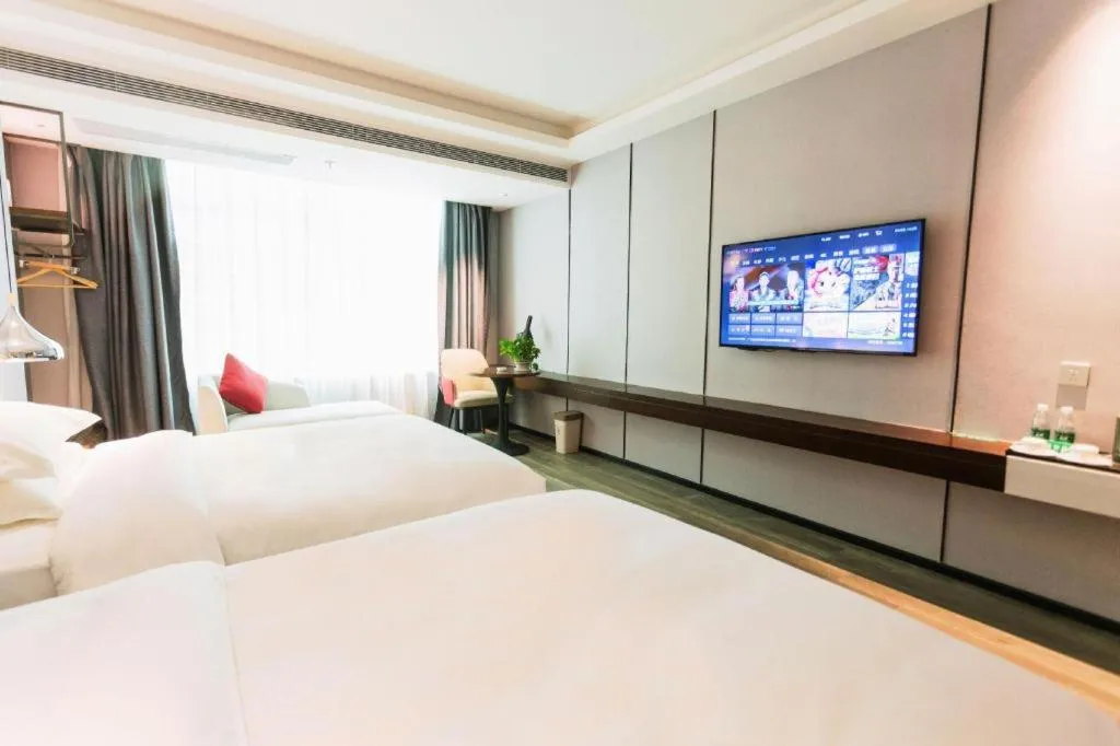 Bed in Borrman Hotel Yunfu Xinxing County Bus Station