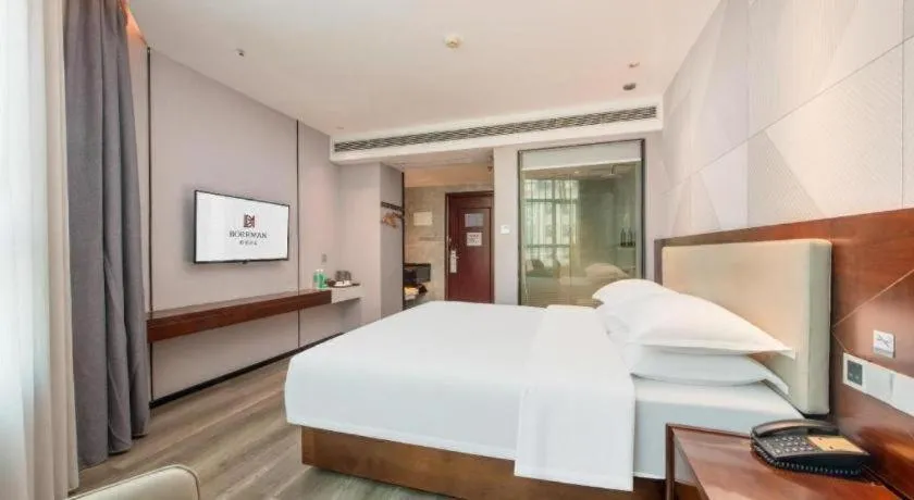 Bed in Borrman Hotel Yunfu Xinxing County Bus Station