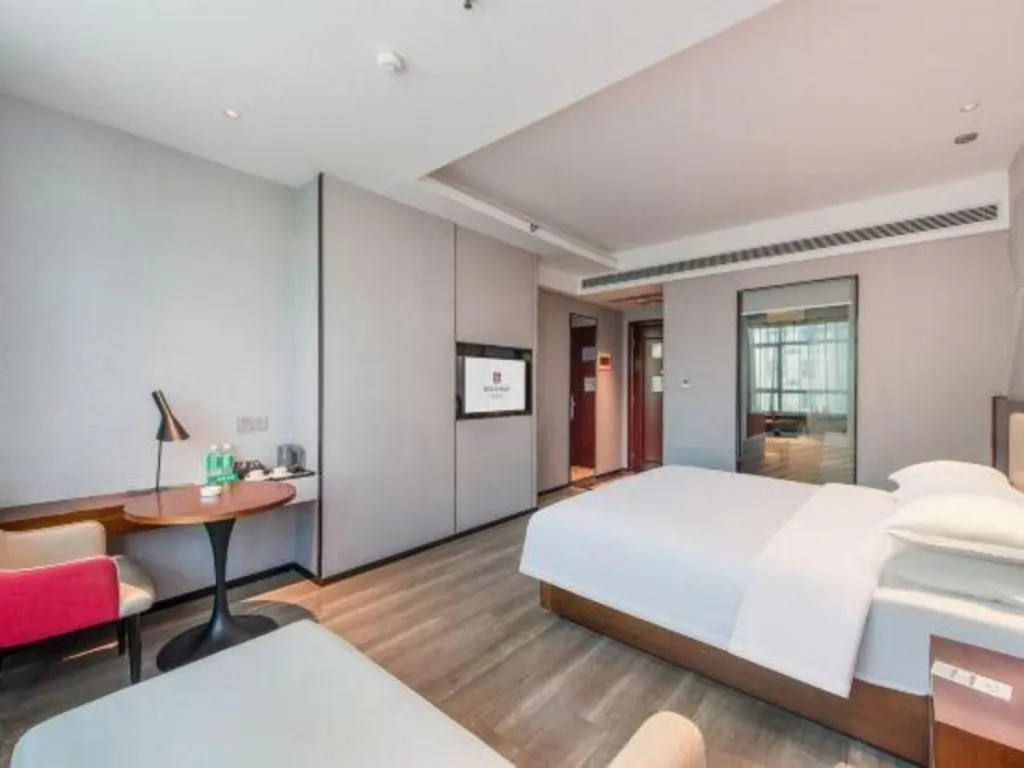 Bed in Borrman Hotel Yunfu Xinxing County Bus Station