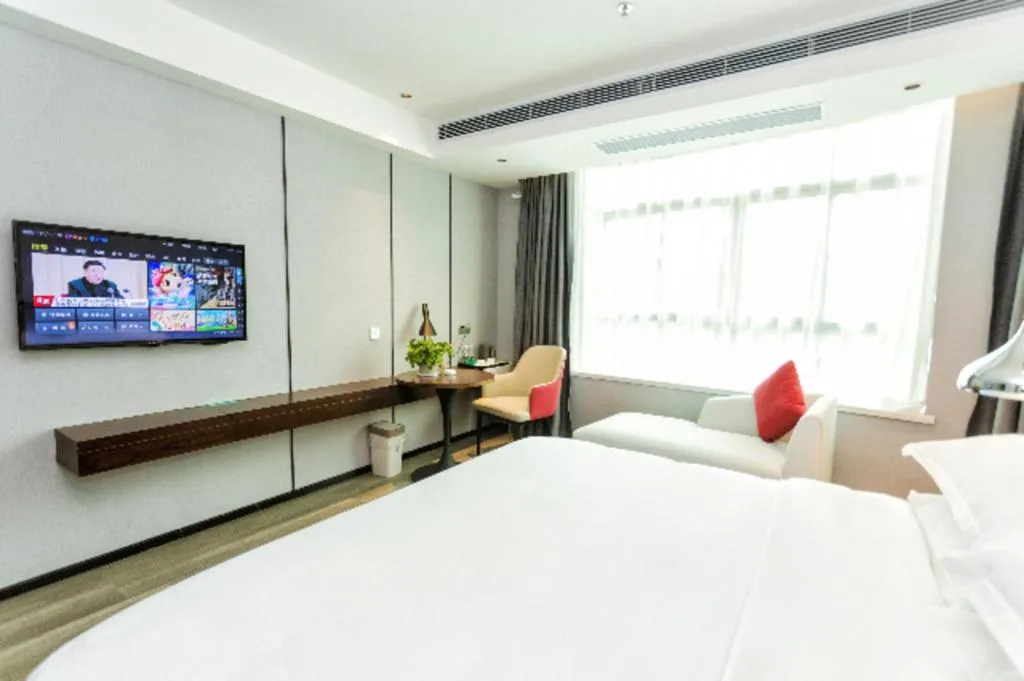 Bed in Borrman Hotel Yunfu Xinxing County Bus Station