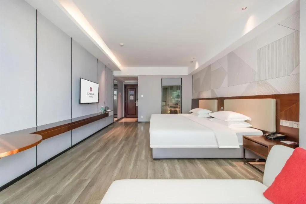 Bed in Borrman Hotel Yunfu Xinxing County Bus Station