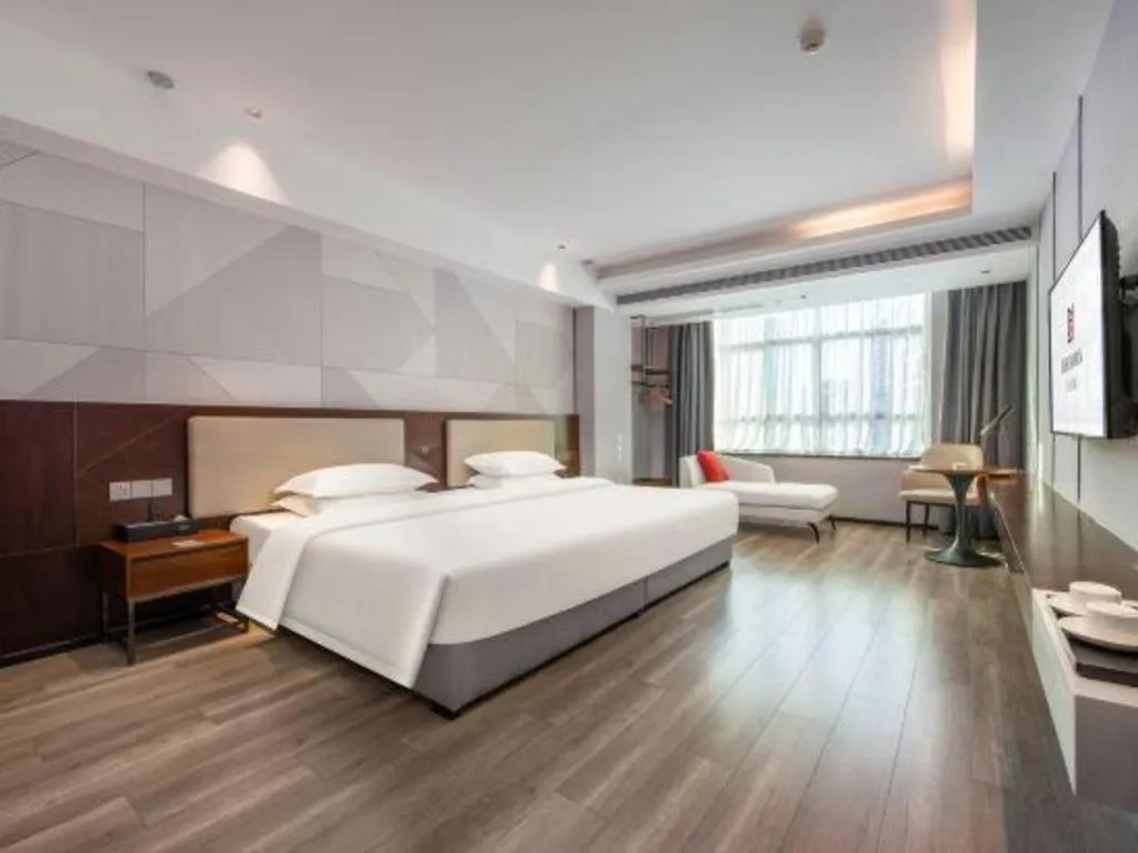 Bed in Borrman Hotel Yunfu Xinxing County Bus Station