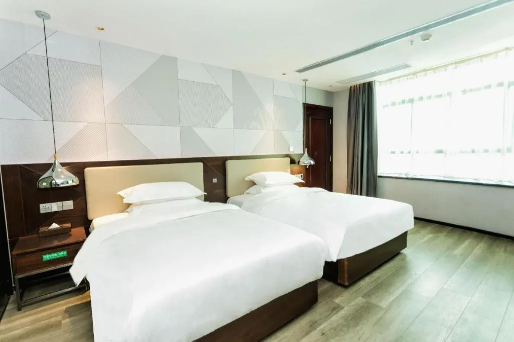 Bed in Borrman Hotel Yunfu Xinxing County Bus Station