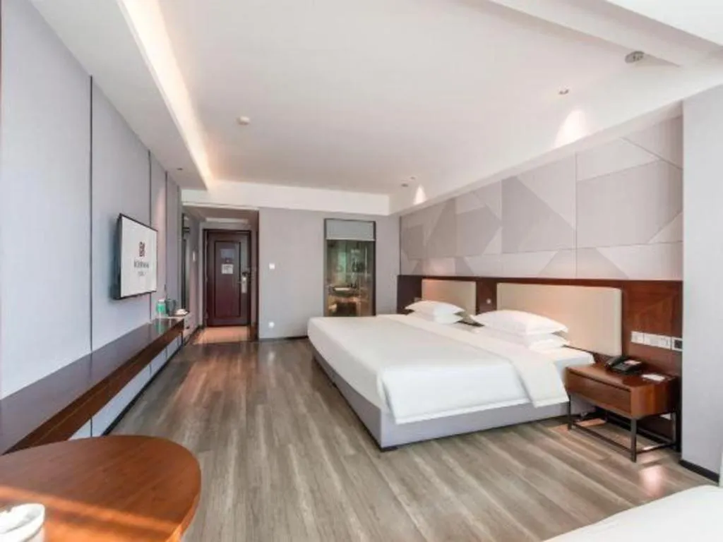 Bed in Borrman Hotel Yunfu Xinxing County Bus Station