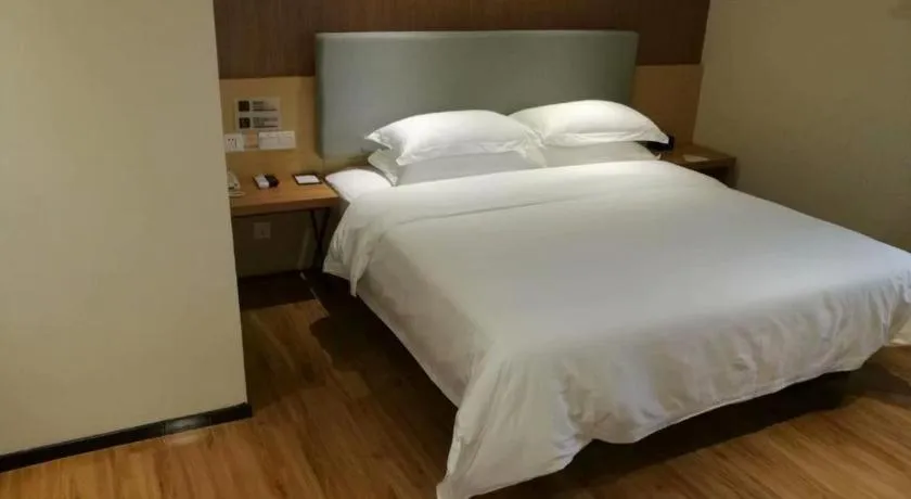 Bed in JTOUR Inn Yulin Bobai County Government Cultural Pedestrian Street