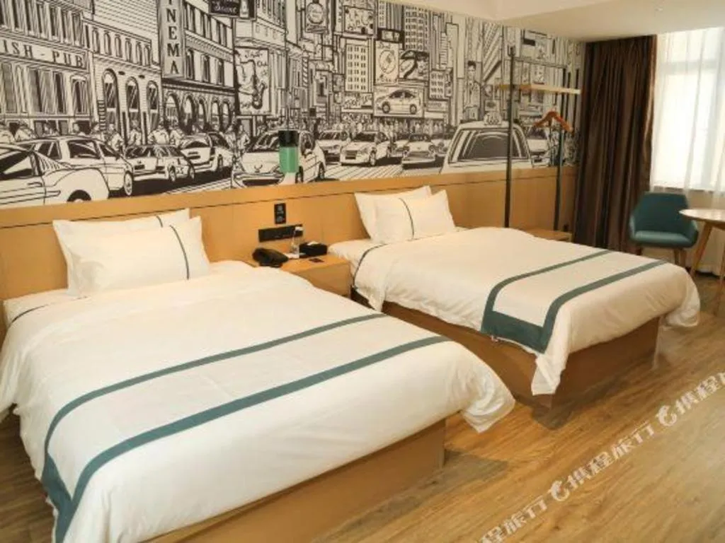 Bed in City Comfort Inn Maoming Binhai New Area Diancheng