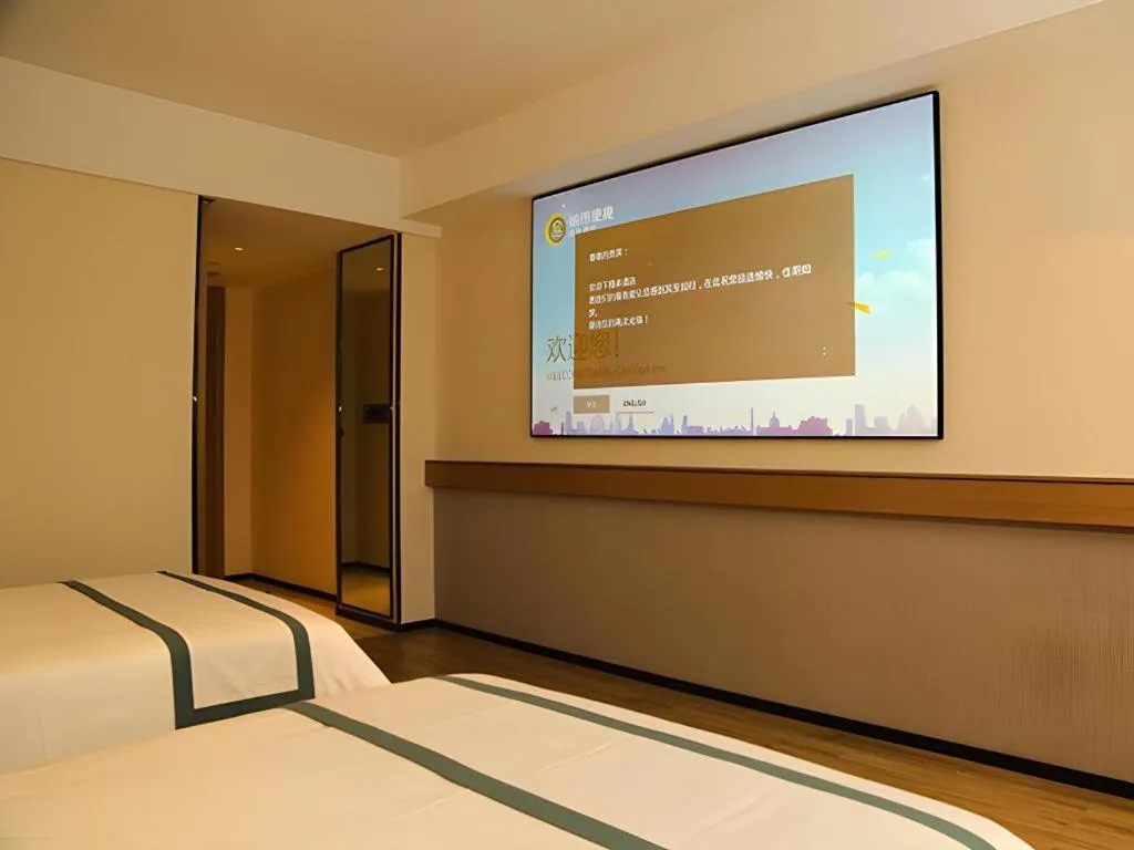 Bed in City Comfort Inn Maoming Binhai New Area Diancheng