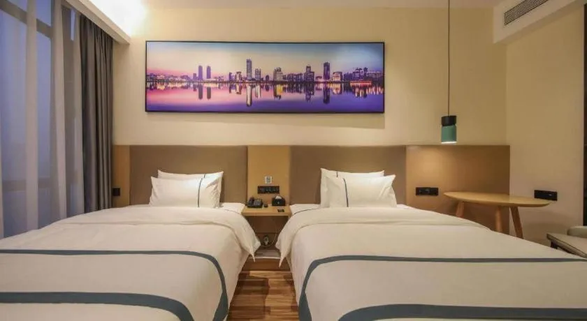 Bed in City Comfort Inn Wuhan Optics Valley Technology Exhibition Center