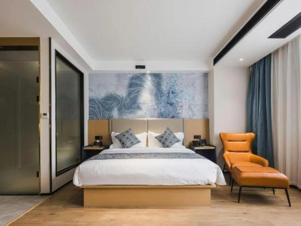 Bed in GEM Hotel Changzhou Xuejia'aoyuan North High-Speed Railway Station