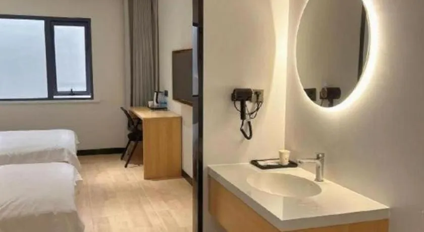 Bed in Shell Hotel Huai'an Zhuqiao Industrial Park