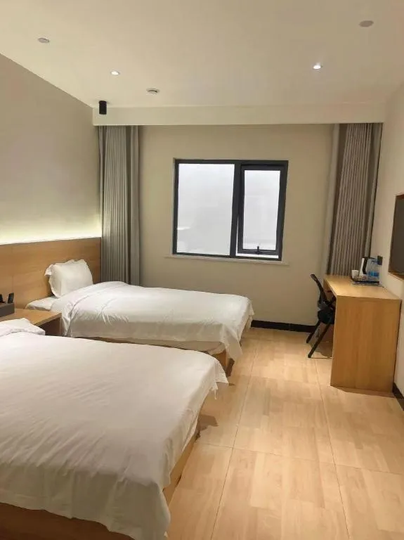Bed in Shell Hotel Huai'an Zhuqiao Industrial Park