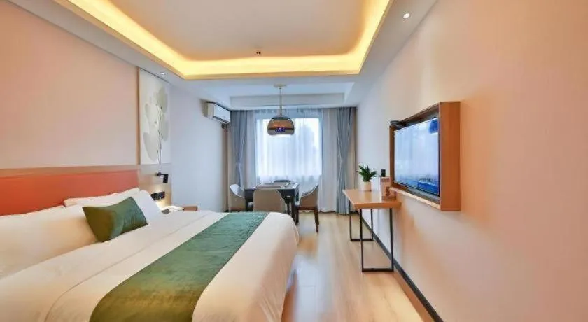 Bed in Green Tree Inn Express Zhejiang Zhoushan Xincheng Zheda