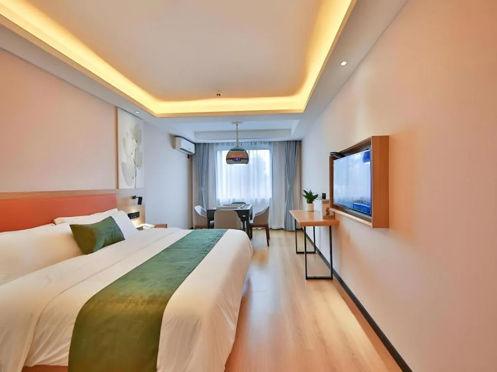 Bed in Green Tree Inn Express Zhejiang Zhoushan Xincheng Zheda