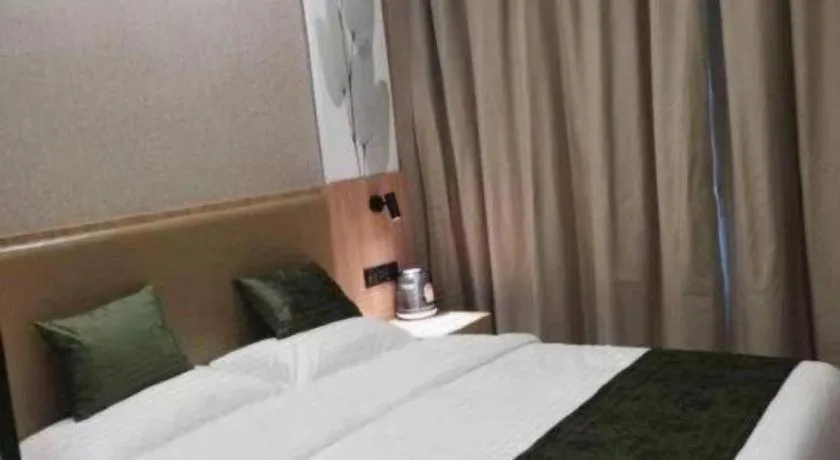 Bed in Shell Hotel Shandong Jinan Daming Lake