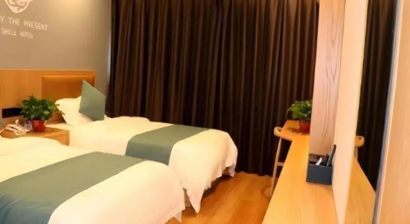 Bed in Shell Hotel Bozhou Lixin County Passenger Center