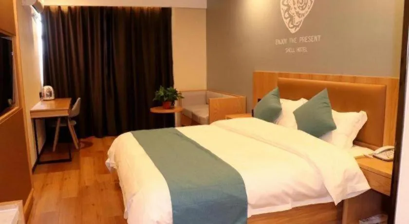 Bed in Shell Hotel Bozhou Lixin County Passenger Center