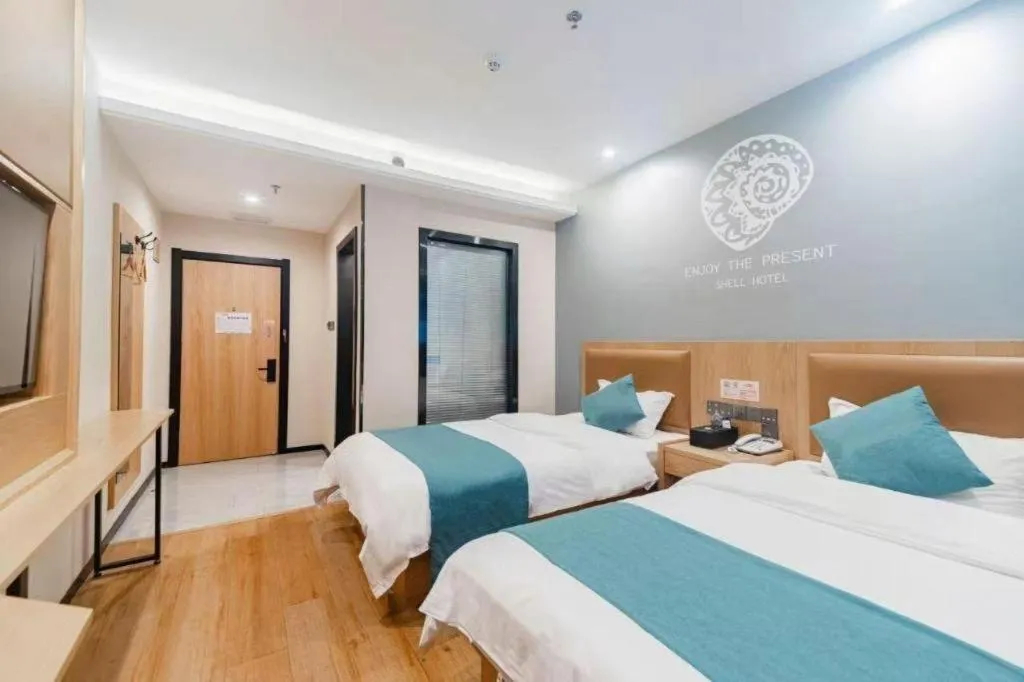 Bed in Shell Hotel Bozhou Lixin County Passenger Center