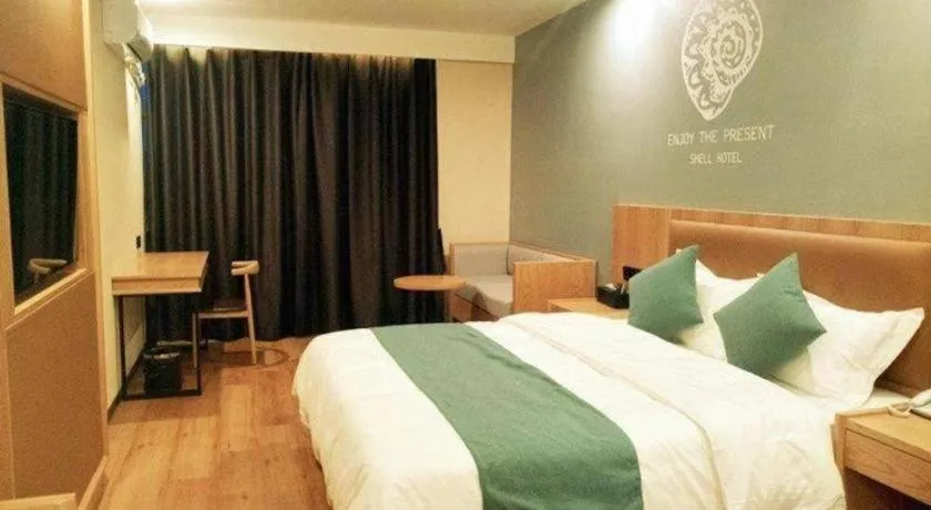 Bed in Shell Hotel Bozhou Lixin County Passenger Center