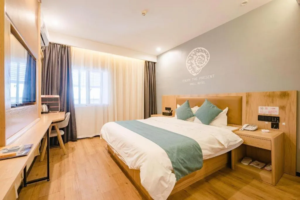 Bed in Shell Hotel Bozhou Lixin County Passenger Center