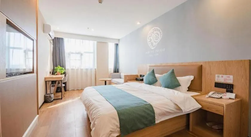 Bed in Shell Hotel Bozhou Lixin County Passenger Center