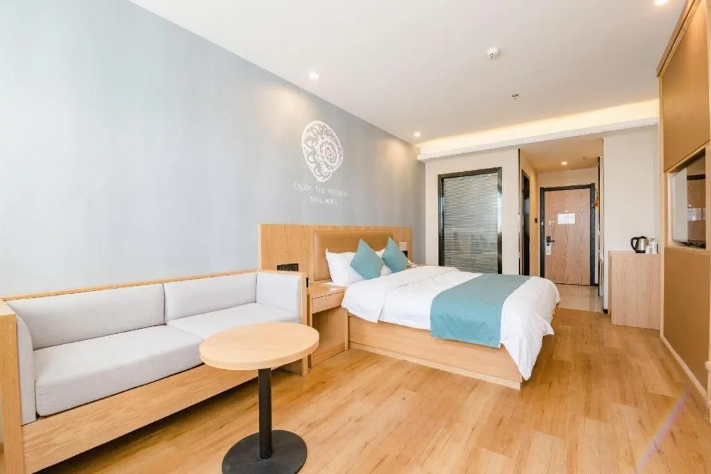 Bed in Shell Hotel Bozhou Lixin County Passenger Center