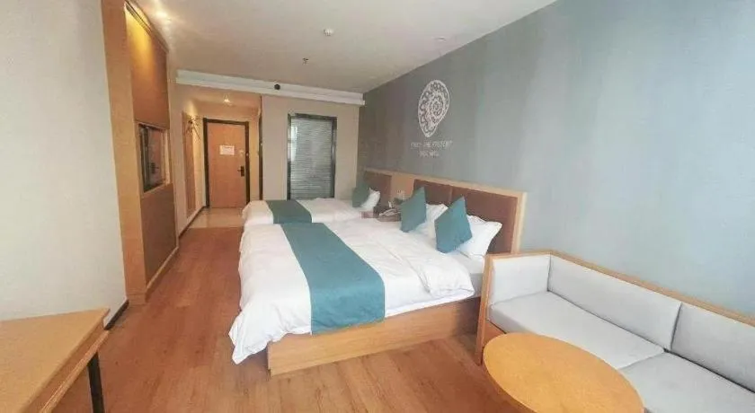 Bed in Shell Hotel Bozhou Lixin County Passenger Center