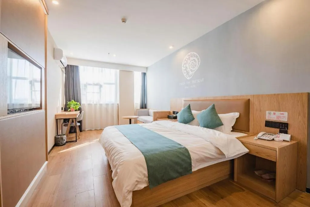 Bed in Shell Hotel Bozhou Lixin County Passenger Center