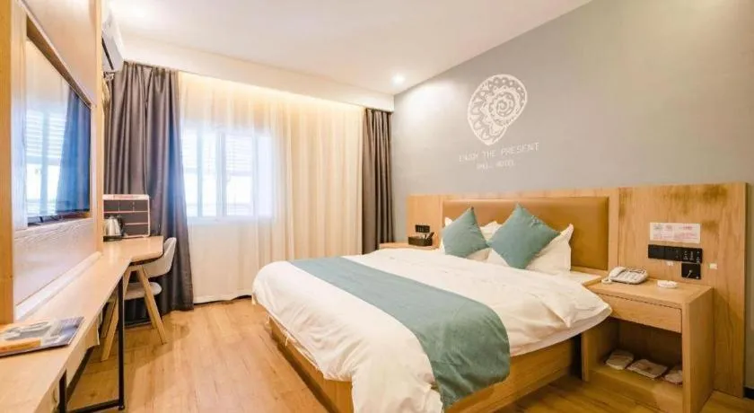 Bed in Shell Hotel Bozhou Lixin County Passenger Center