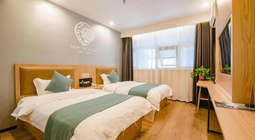 Bed in Shell Hotel Bozhou Lixin County Passenger Center