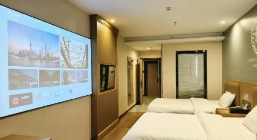 Bed in Shell Hotel Bozhou Lixin County Passenger Center