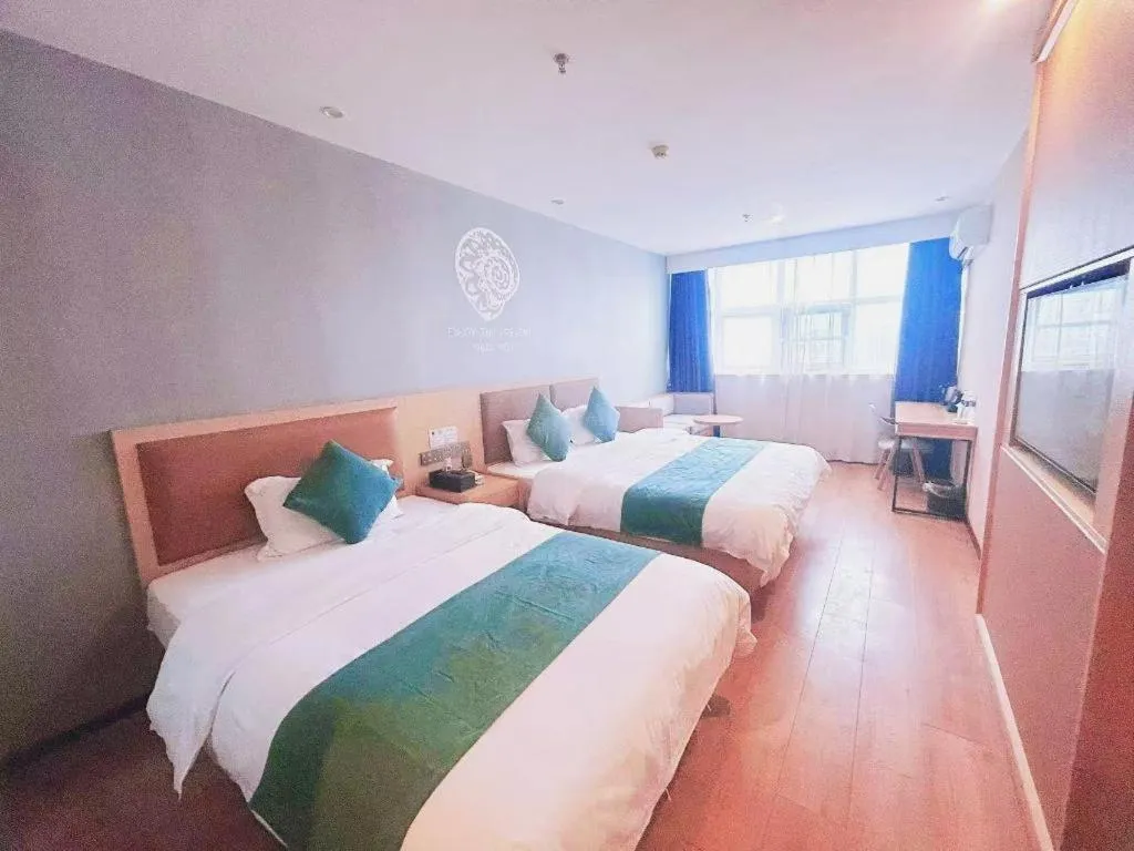 Bed in Shell Hotel Bozhou Lixin County Passenger Center