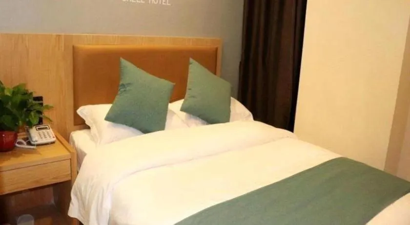 Bed in Shell Hotel Bozhou Lixin County Passenger Center