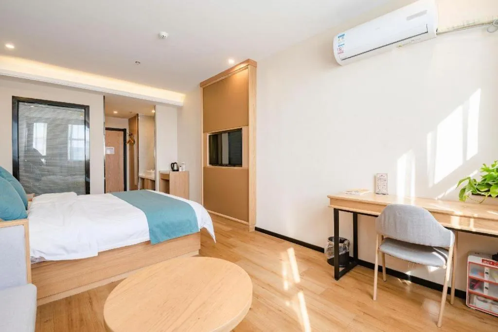 Bed in Shell Hotel Bozhou Lixin County Passenger Center