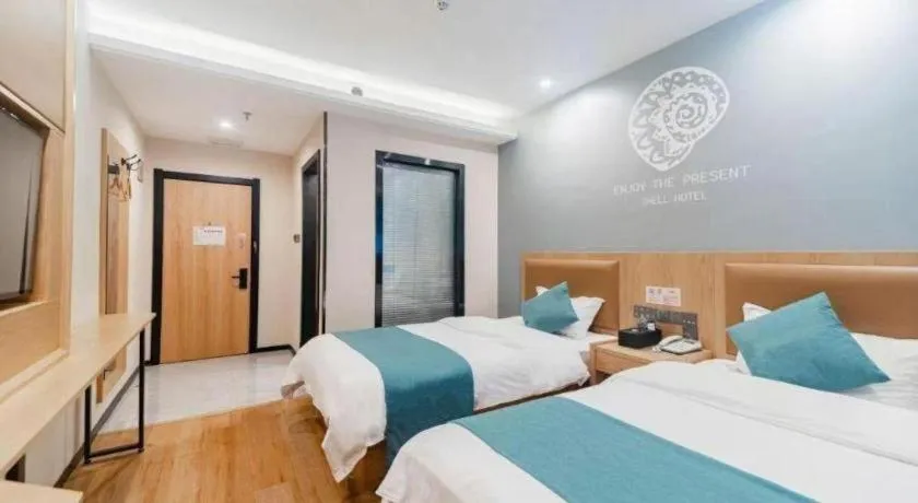 Bed in Shell Hotel Bozhou Lixin County Passenger Center