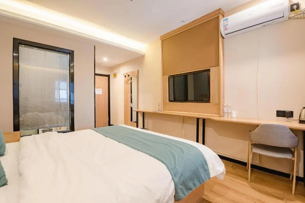 Bed in Shell Hotel Bozhou Lixin County Passenger Center