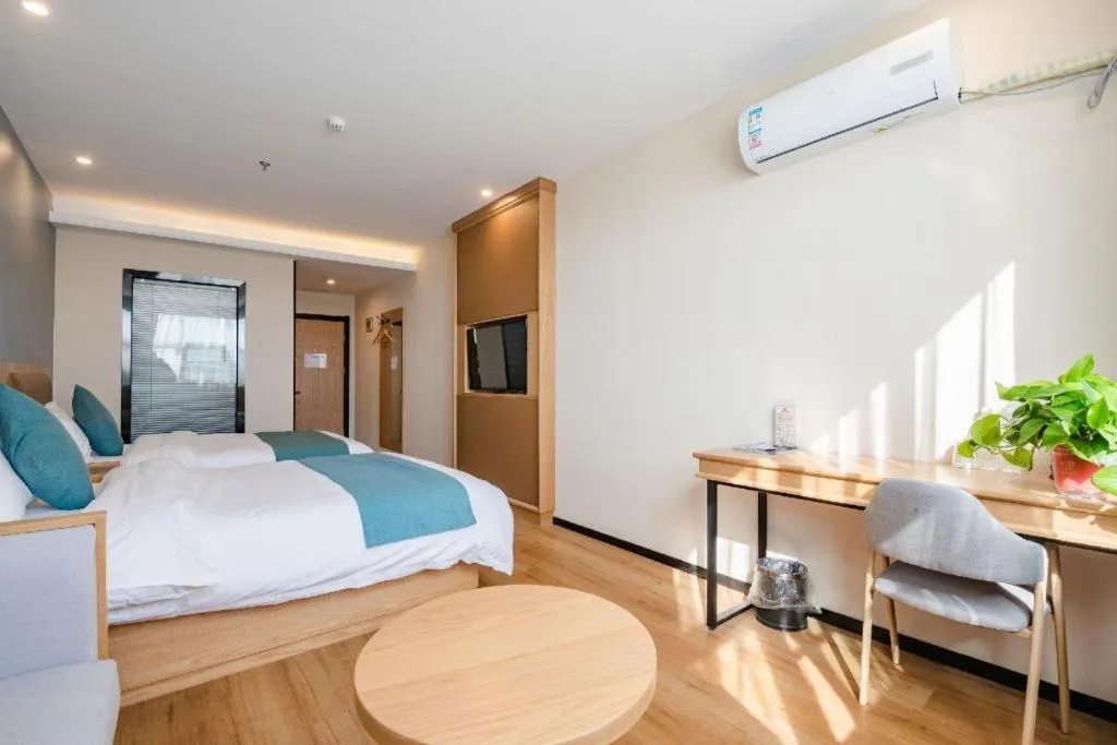 Bed in Shell Hotel Bozhou Lixin County Passenger Center