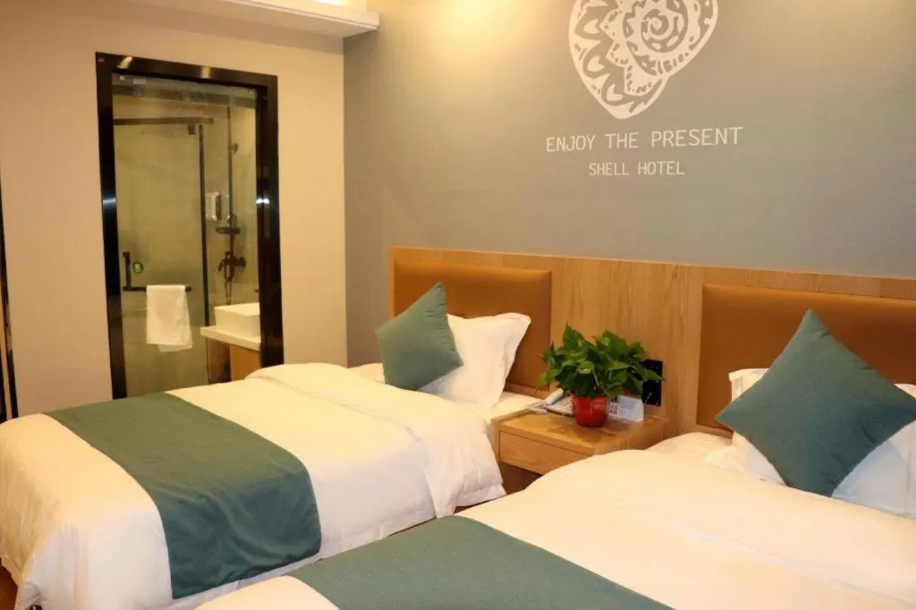 Bed in Shell Hotel Bozhou Lixin County Passenger Center